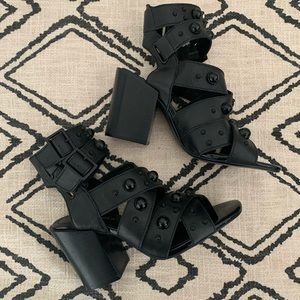 Black heeled sandals with black pearl detail!